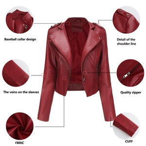 Detailed close-up of dark red biker jacket with rivets, zippers, and quilted texture