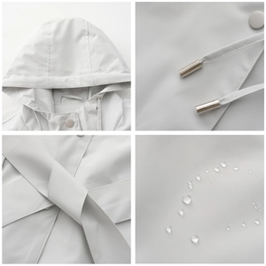 Detailed views of hooded water-resistant trench coat with metal drawstrings and belt