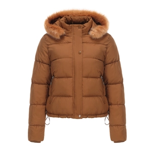 Detail of warm caramel winter coat with faux fur collar and quilted texture
