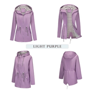 Detail of light purple rain jacket featuring striped lining and adjustable drawstring waist
