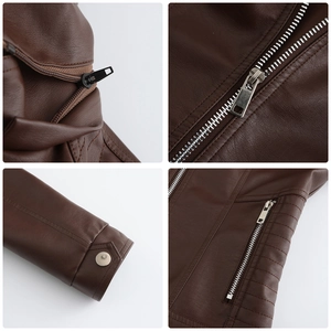 Detail view of dark brown leather jacket with metal zippers and snap button cuffs