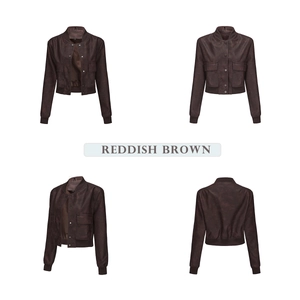 Detail view of reddish brown vintage bomber jacket with ribbed cuffs and cargo pockets