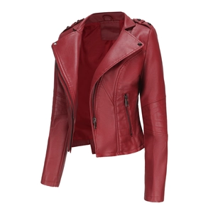 Detail of burgundy leather jacket featuring quilted shoulder patterns and metal zippers