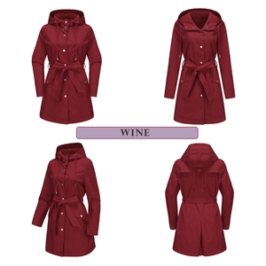 Detail view of wine red hooded windbreaker featuring adjustable drawstring and waist belt