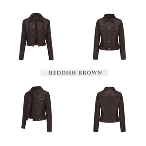 Detail of reddish brown faux leather jacket with metal zippers and vintage texture