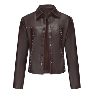 Detail of vintage brown leather jacket with silver rivets and metal snap buttons