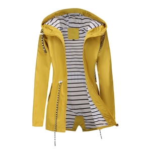 Detail of yellow waterproof raincoat showing striped lining and drawstring hood