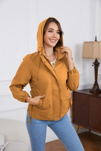 Detail of ginger yellow hooded windbreaker with zip closure and adjustable drawstring