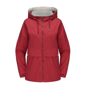 Detail of red windproof hooded jacket featuring light grey lining and full zip closure