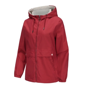 Detail of red hooded windbreaker featuring metal zipper, drawstring and large white snap pockets