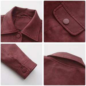 Detail view of burgundy faux leather jacket featuring lapels and matte snap pockets