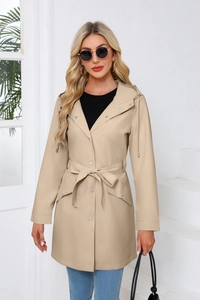 Detailed view of women's hooded khaki trench coat with adjustable drawstring and waist belt