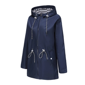 Detail of navy hooded raincoat with striped lining and adjustable drawstring waist