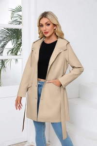 Detail of hooded water-repellent trench coat with drawstring hood and metal snap buttons