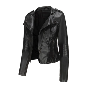 Detail of female biker jacket showing metal zipper, lapel studs and quilted sleeve texture