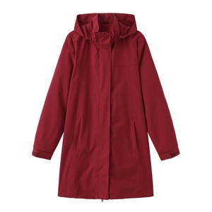 Detail view of water-resistant deep red hooded trench coat with Velcro cuffs and zipper flap