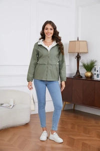 Detail view of olive green hooded jacket with full zipper and decorative waist flaps
