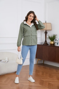Close-up of hooded windbreaker featuring zipper closure and large flap pockets