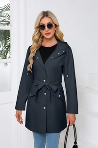 Detail of navy blue water-resistant hooded trench coat with adjustable waist belt and snap buttons