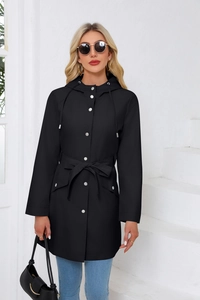 Detail of a black hooded windbreaker featuring silver buttons and an adjustable waist belt