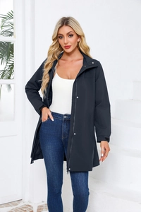 Detail of navy hooded windbreaker showing zipper closure and high-quality waterproof fabric
