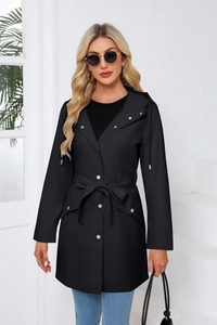 Detail of waterproof hooded trench coat featuring silver snap buttons and adjustable waist belt