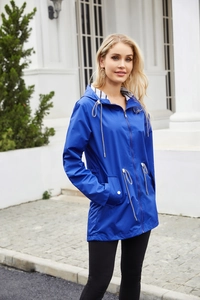 Detail of royal blue hooded raincoat with adjustable waist drawstring and striped lining