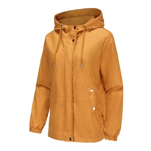 Detail of mustard yellow hooded windbreaker with metal snap buttons and drawstring hood