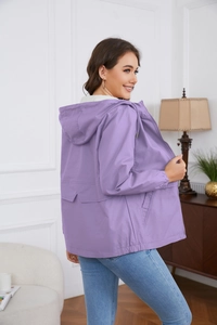Rear view of a stylish purple hooded windbreaker with zip closure and layered back stitch