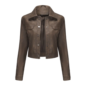 Detail view of deep brown short PU leather jacket with classic collar and pocket details