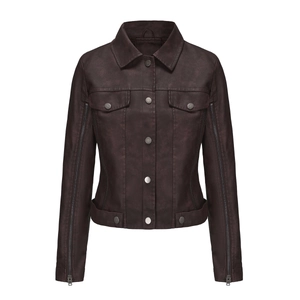 Detail of slim brown motorcycle jacket featuring metal zippers along the sleeves
