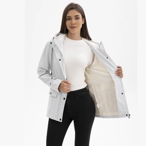 Detail showing plush white fleece lining inside a hooded windproof jacket for women