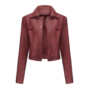 Detail of burgundy PU leather jacket featuring classic lapel and buttoned flap pockets