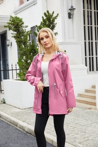 Pink hooded raincoat detail showing striped lining hood and adjustable waist drawstrings