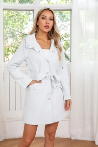 Detailed view of women hooded trench coat featuring adjustable drawstring and waist belt