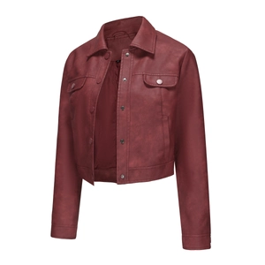 Detail of burgundy faux leather jacket showing silver metal buttons and pocket texture
