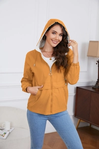 Detail of hooded casual jacket with round metal zipper ring and elastic cuffs