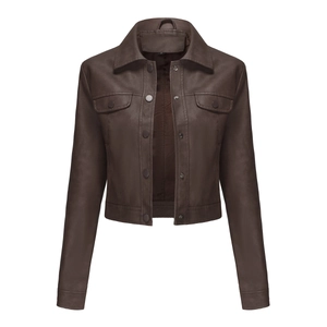 Detail of a dark brown faux leather jacket featuring buttoned chest pockets and collar