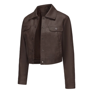 Detailed view of dark brown PU leather jacket featuring chest pockets and metal snap buttons