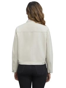 Detail view of the back of a beige faux leather jacket with silver zipper cuffs and buckles