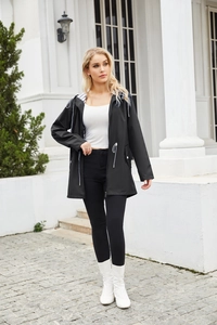 Detail of hooded black raincoat with striped lining and adjustable waist drawstring