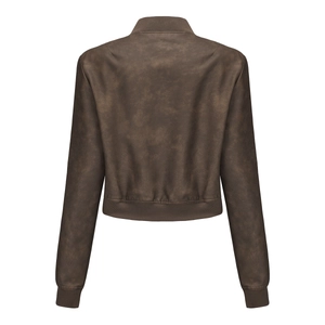 Detail view of the brown faux leather jacket back with textured finish and ribbed hem