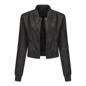 Detailed close-up of a black oversized PU leather jacket with ribbed cuffs and snap buttons