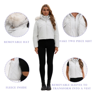 Detail view of white padded jacket with detachable hood and sleeves for vest conversion