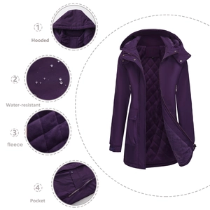 Detail view of purple water-resistant jacket with fleece lining and hooded design