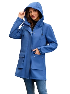 Detail of royal blue hooded raincoat with waterproof fabric and large flap pockets