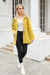 Detail of yellow hooded raincoat with striped lining and adjustable waist drawstring