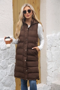 Detail view of long hooded quilted vest with zipper and snap buttons in dark brown