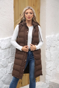 Close-up of the hooded quilted long vest featuring metal zipper and snap button closure