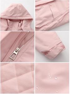 Detail view of pink parka with waterproof fabric, zipper pocket and quilted lining